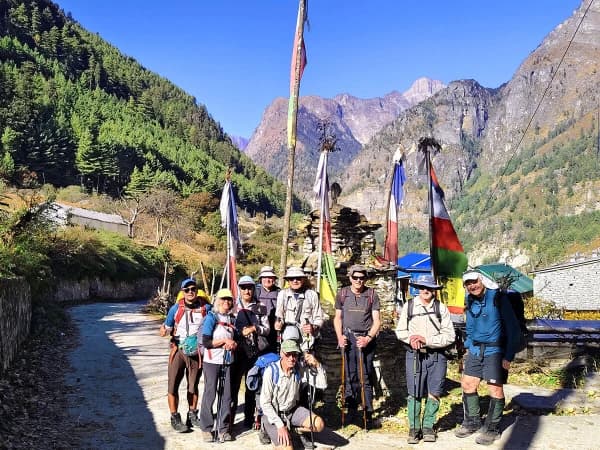 Rocky Winding Annapurna Circuit Trail Ascending Hillside Prayer Flags Fluttering