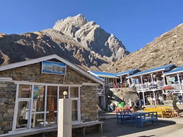 Tilicho Base Camp With Lodges And Distant Mountains